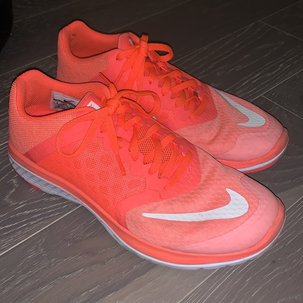 Lightly worn neon Nike sneakers